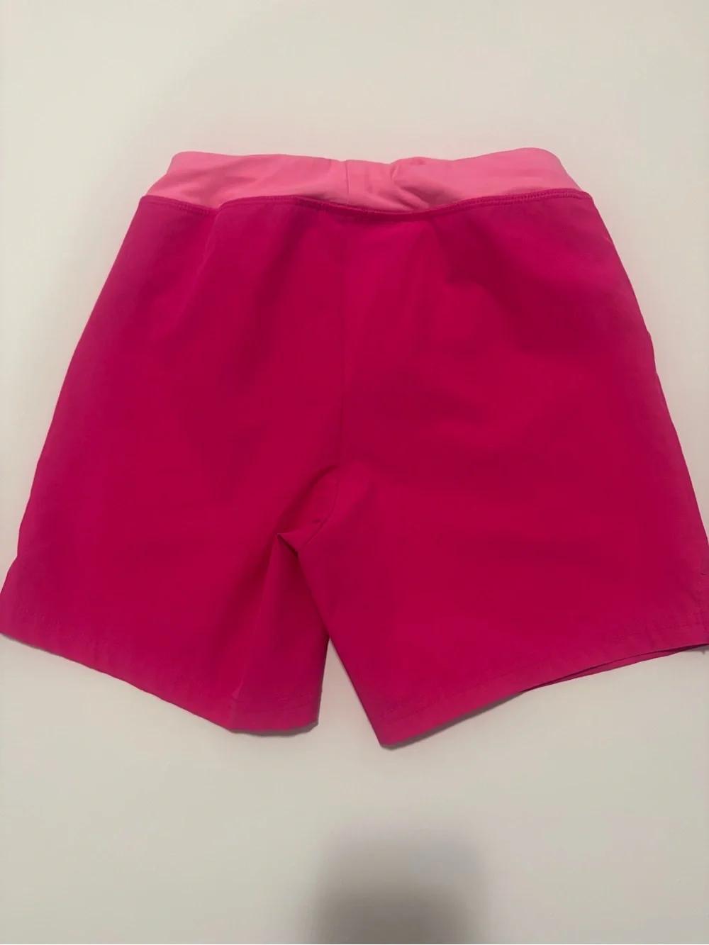Pink swim shorts